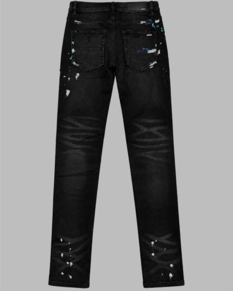 AMIRI Aged Black Paint Splatter MX1 Jeans.