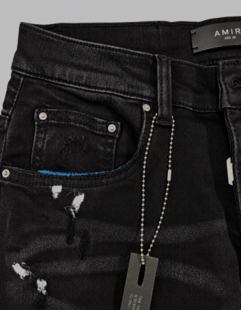 AMIRI Aged Black Paint Splatter MX1 Jeans.