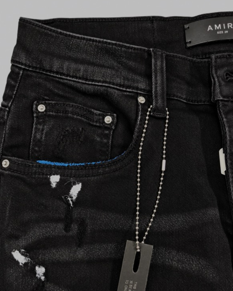 AMIRI Aged Black Paint Splatter MX1 Jeans.