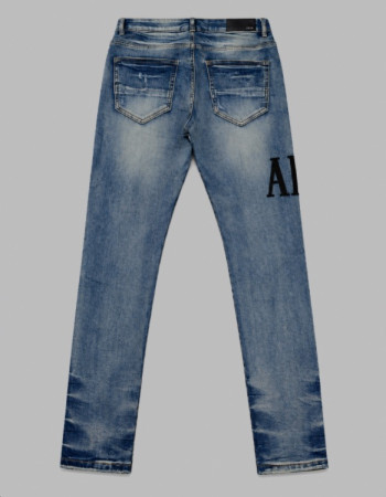 AMIRI Light Indigo & Black Core Appliqué Logo Jeans.