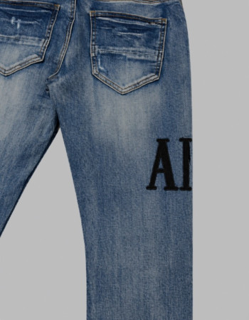 AMIRI Light Indigo & Black Core Appliqué Logo Jeans.