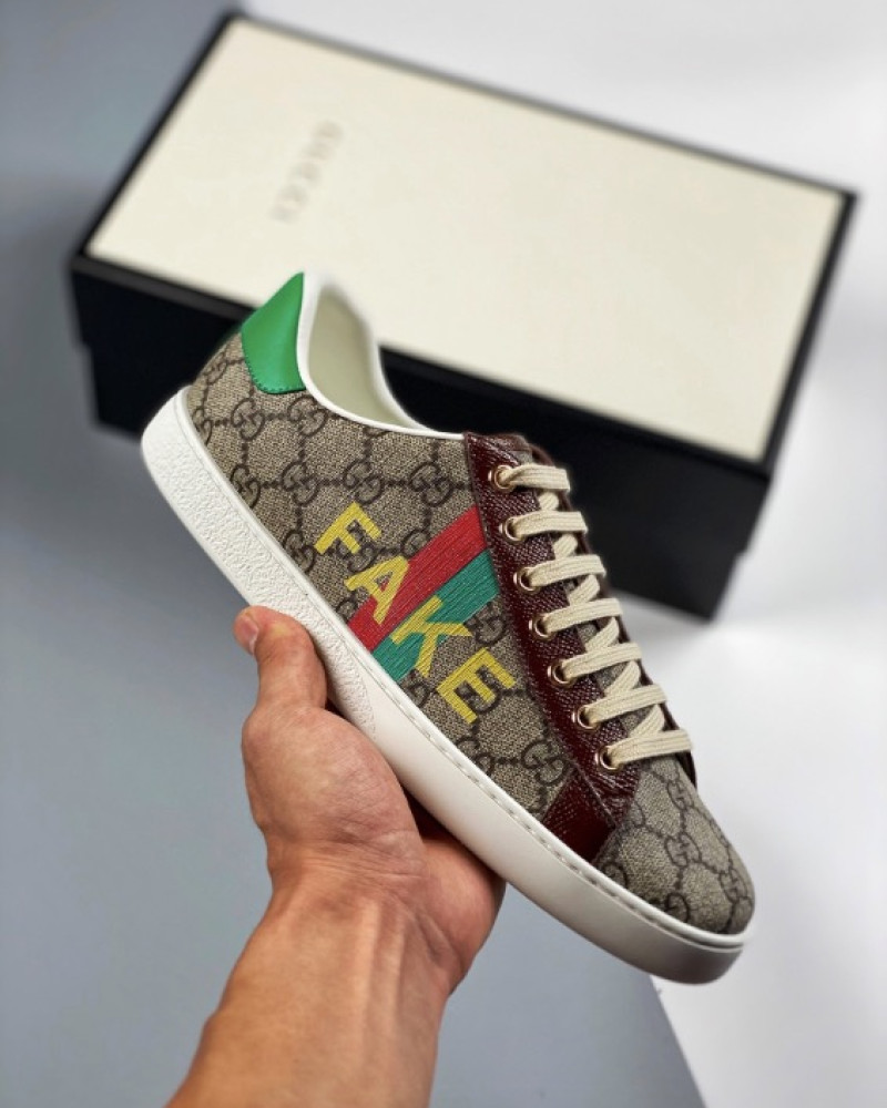 Gucci Ace "Fake/Not" GG Supreme Sneakers.
