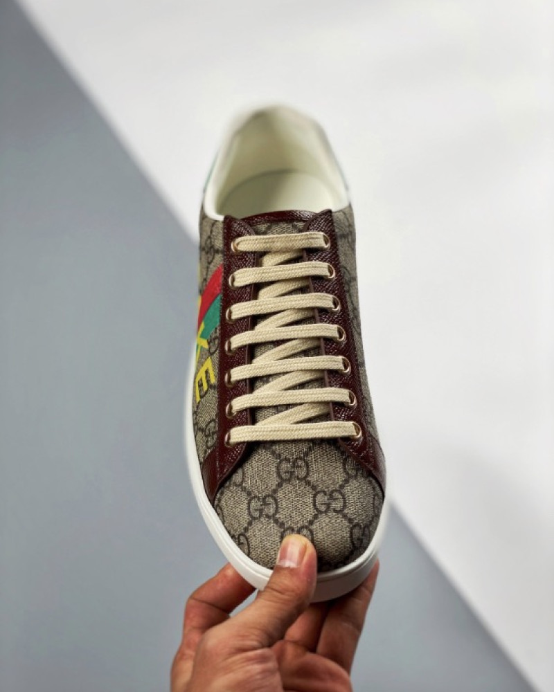 Gucci Ace "Fake/Not" GG Supreme Sneakers.