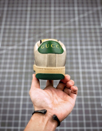 Gucci Screener GG Low-Top Sneakers.