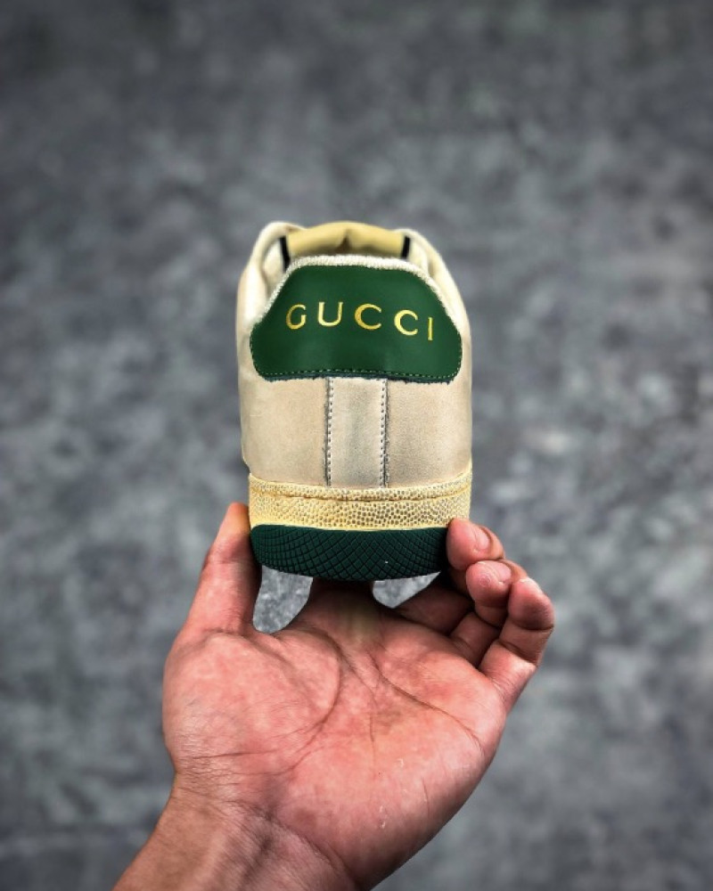 Gucci Screener GG Low-Top Sneakers.