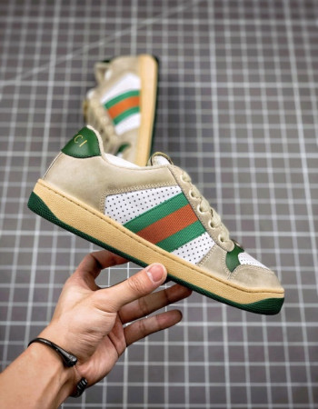 Gucci Screener GG Low-Top Sneakers.
