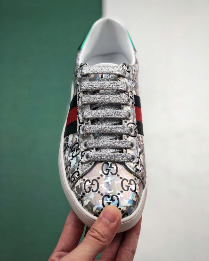 Gucci Ace GG Supreme Holographic Sneakers.