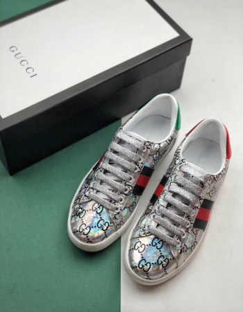 Gucci Ace GG Supreme Holographic Sneakers.