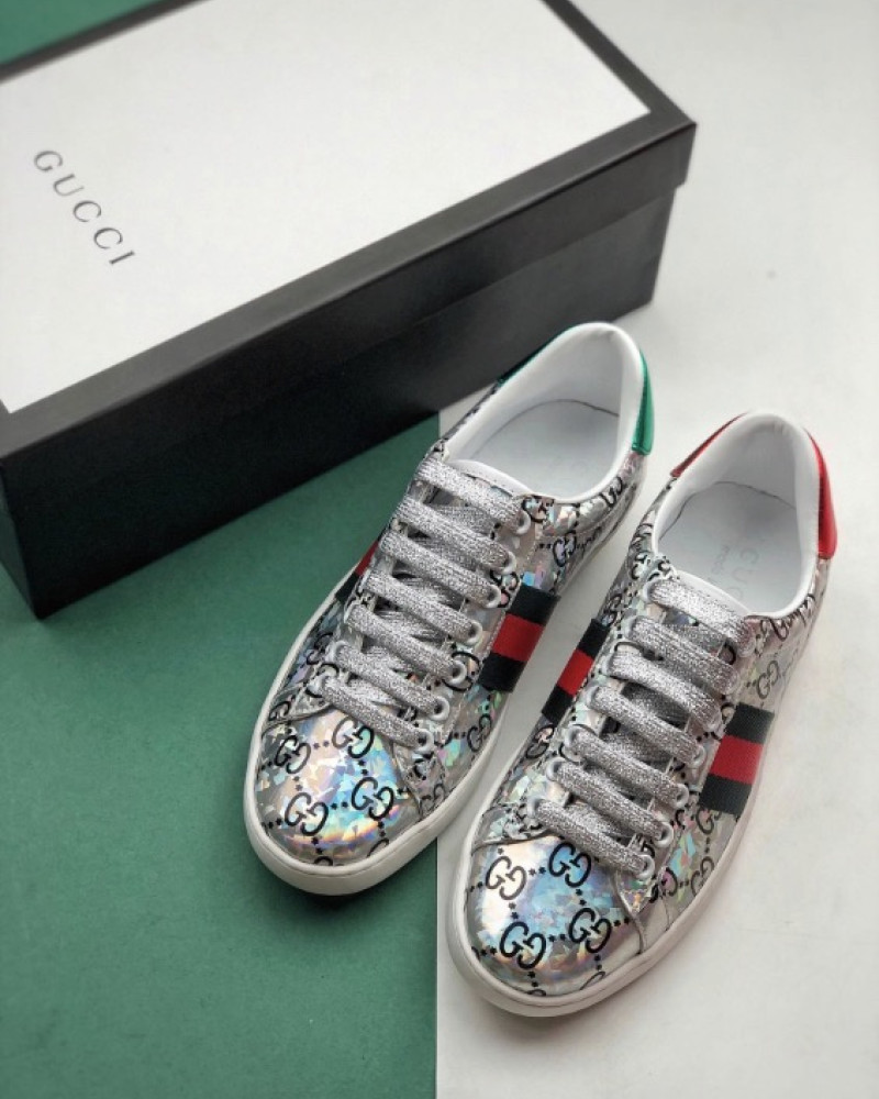 Gucci Ace GG Supreme Holographic Sneakers.