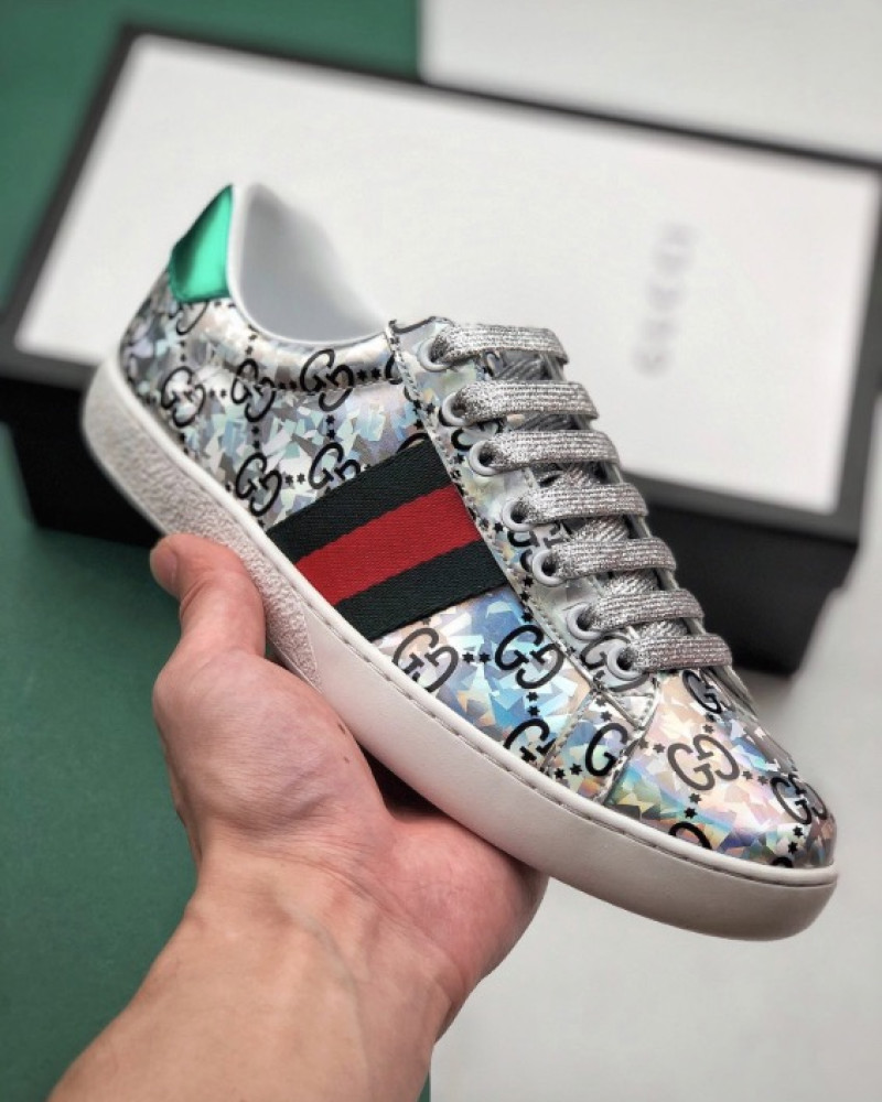 Gucci Ace GG Supreme Holographic Sneakers.
