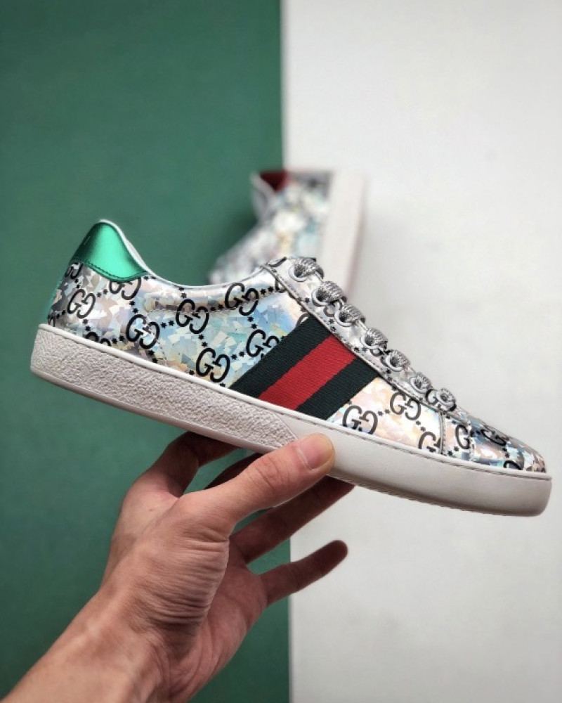 Gucci Ace GG Supreme Holographic Sneakers.